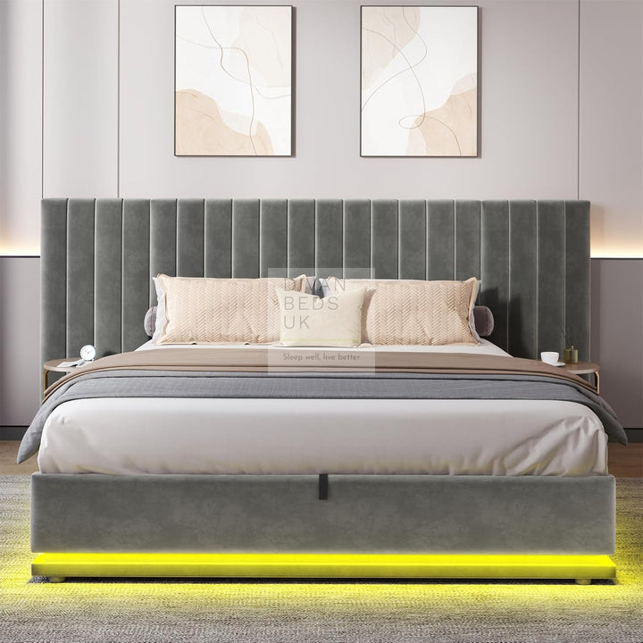 Giuliana Oversized Headboard Soft Grey Velvet Ottoman Storage Bed with LED Lighting