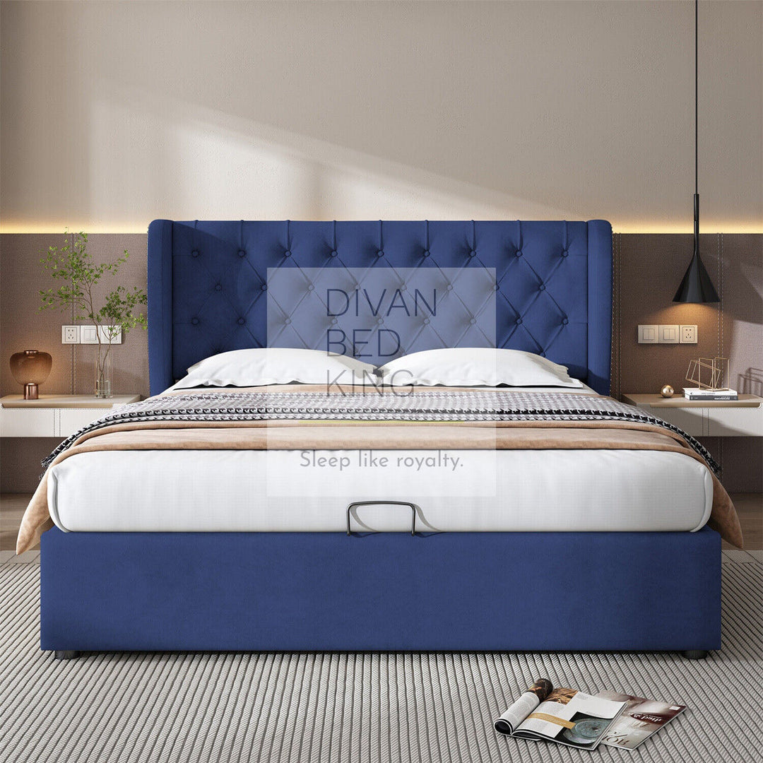 Serenity 4FT6 Double Blue Plush Velvet Wingback Ottoman Storage Bed Frame